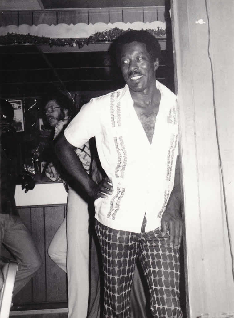 Buddy Guy at the Checkerboard Lounge in the 1970s - By Andre Hobus